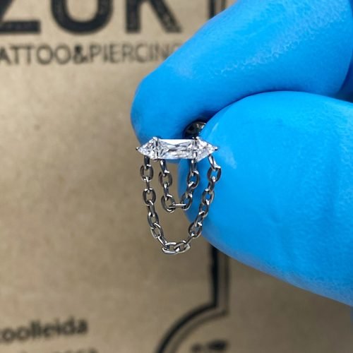 Top de titanio con zirconias y cadenas