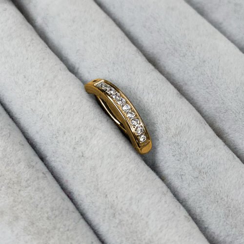 Clicker de ombligo con baño de oro y zirconias blancas
